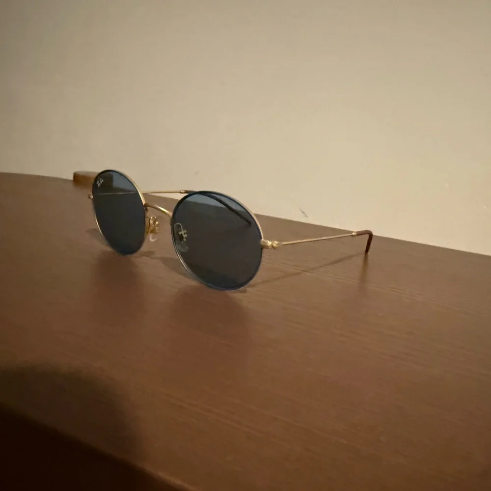 Ray-Ban Gold Frame Sunglasses with Black Lenses